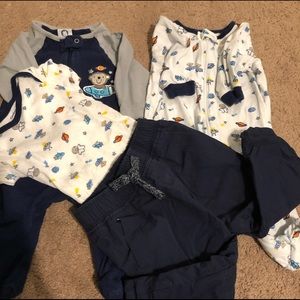 Lot of 2 pjs 2 shirts 1 pants. Size 0-3 & 3-6.